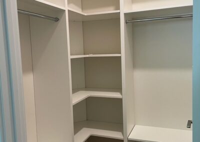 Custom shelving in a walk in closet in Nelson BC