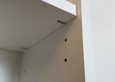 Details of custom shelves by Steinegg Cabinets