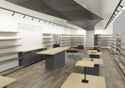 Large area with open shelves all around the walls and many custom tabletops