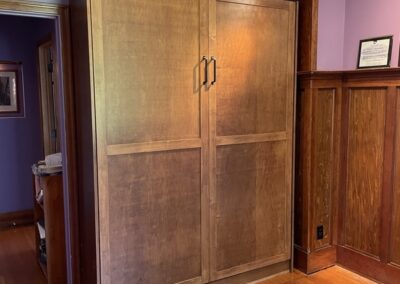 Large wooden storage cabinet.