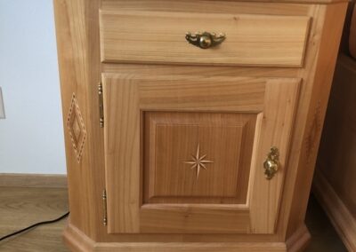 Photo of a custom end table with a drawer and small door.