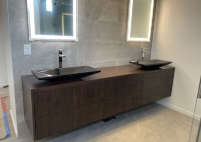 Decorative bathroom vanity with double sinks and mirrors