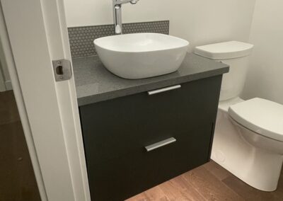 Decorative bathroom vanity with floor lighting