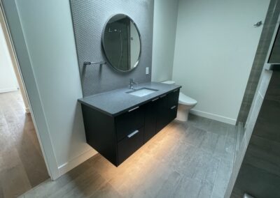 Decorative bathroom vanity with floor lighting